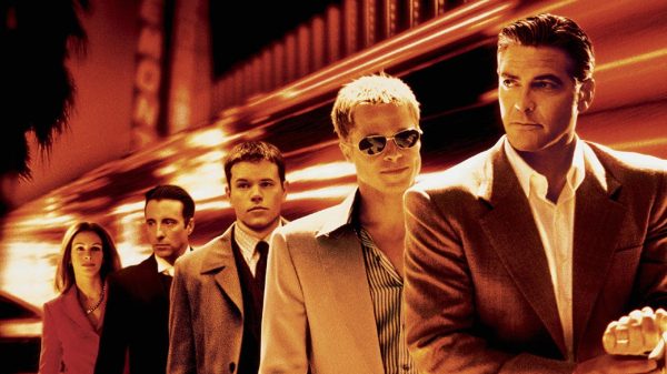 Nas telas do cinema Brad Pitt e George Clooney lideraram uma das mais sensacionais equipes de assaltantes (Divulgação)